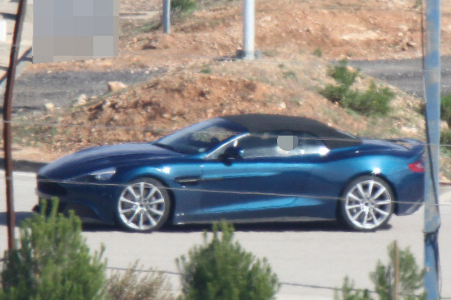 Name:  Erlkoenig-Aston-Martin-Vanquish-Roadster-19-fotoshowImageNew-5d5a1fcd-643211.jpg
Views: 829
Size:  96.7 KB