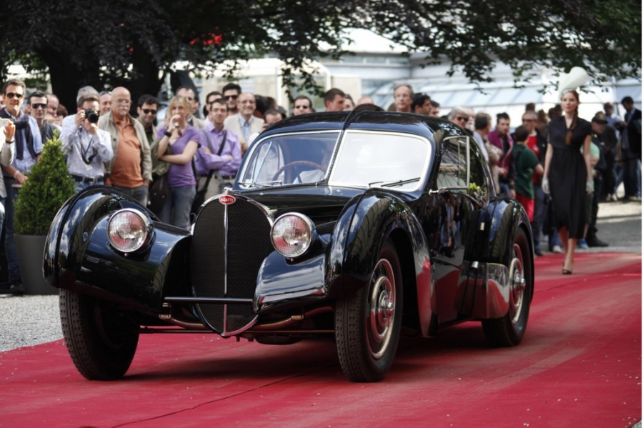 Name:  ralph-lauren-and-his-1938-bugatti-57sc-atlantic_100428385_l.jpg
Views: 1747
Size:  196.2 KB