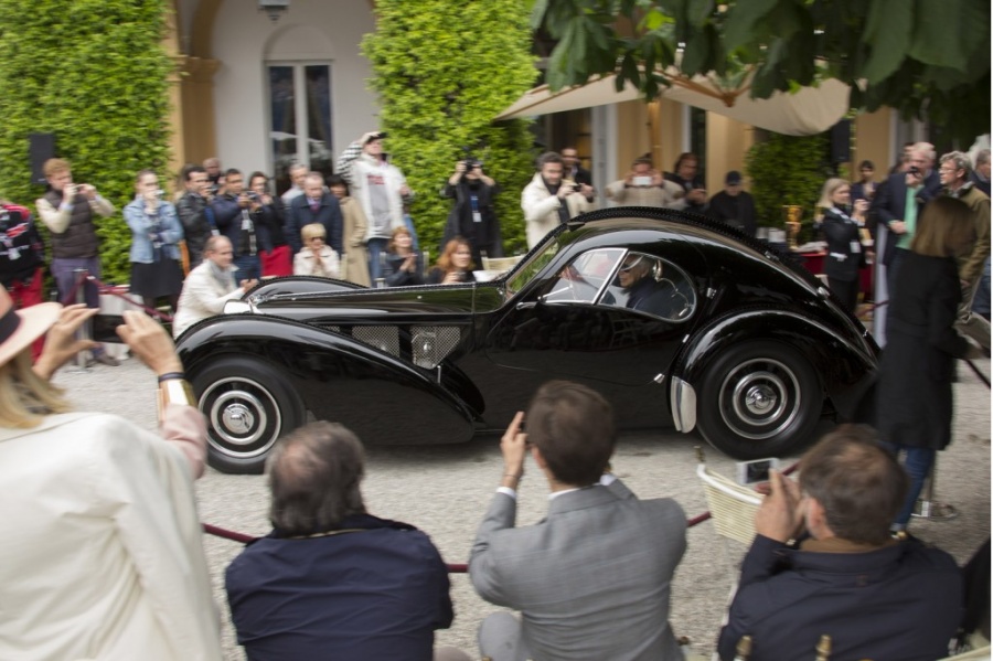 Name:  ralph-lauren-and-his-1938-bugatti-57sc-atlantic_100428383_l.jpg
Views: 1165
Size:  180.2 KB
