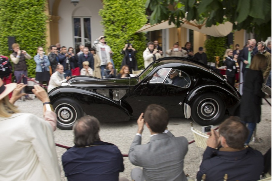 Name:  ralph-lauren-and-his-1938-bugatti-57sc-atlantic_100428383_l.jpg
Views: 1183
Size:  180.2 KB