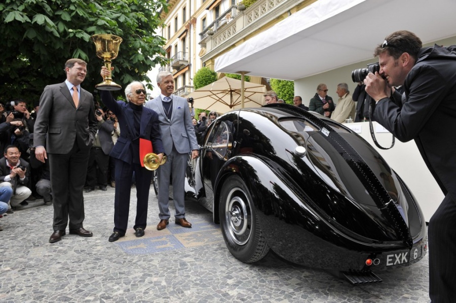 Name:  ralph-lauren-and-his-1938-bugatti-57sc-atlantic_100428386_l.jpg
Views: 1236
Size:  230.8 KB