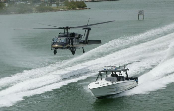 Name:  39GovernmentBoatsRunningwithBlackHawkHelicoptercopy2_002.jpg
Views: 2242
Size:  50.7 KB