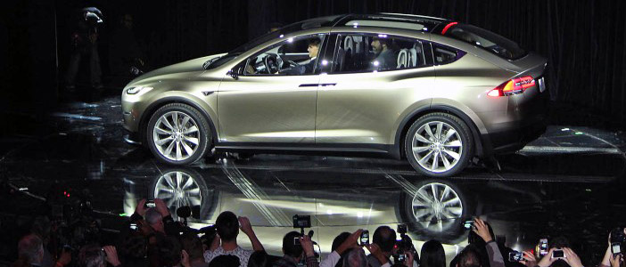 Tesla unveils its Model X cross-over styled EV